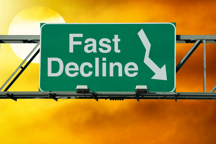 road banner of green colour indicating fast decline with downward facing arrow