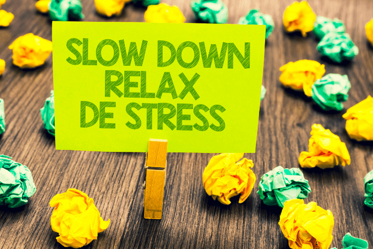 a clip holding green sticky not with -- heading slow down relax de stress