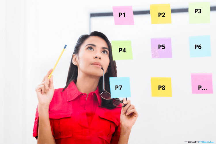 A girl looking at colored sticky notes with P1 to P8 text