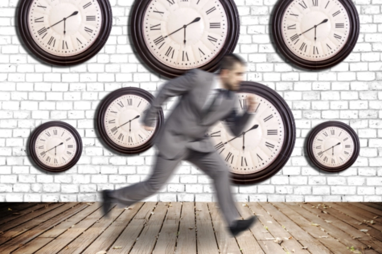 Various Wall Clocks Ticking and Blurry person running signifying urgency