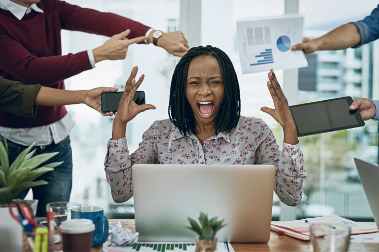 a woman struggling due to multiple tasks at same time