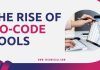 The Rise of No-Code Tools: Empowering Non-Technical Project Managers Graphic with bold text 'The Rise of No-Code Tools'; image of hands using a tablet displaying charts.