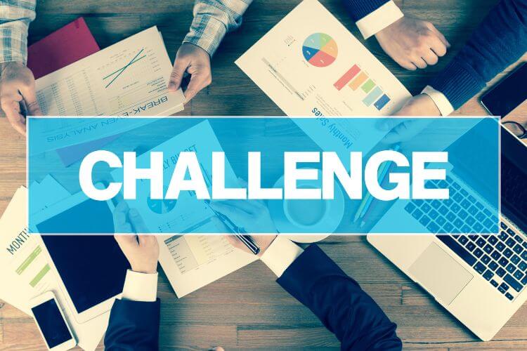 Team analyzing retail ERP challenges with business charts and performance reports on a meeting table